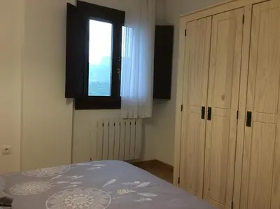 Cama o camas de una habitación en Balcón de Garbisón I