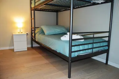 Cama o camas de una habitación en Apartamenticos Plaza del Pilar I