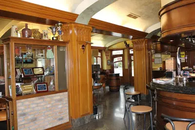 El salón o zona de bar de Hostal Casa Perico