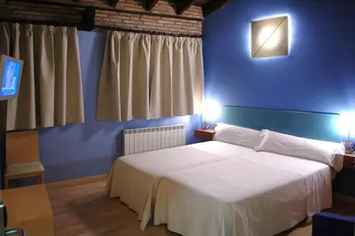 Cama o camas de una habitación en La Merced de la Concordia