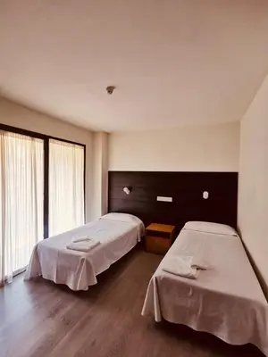 Cama o camas de una habitación en Hotel Delicias