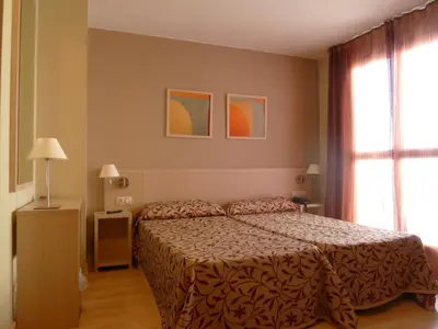 Cama o camas de una habitación en Arcohotel