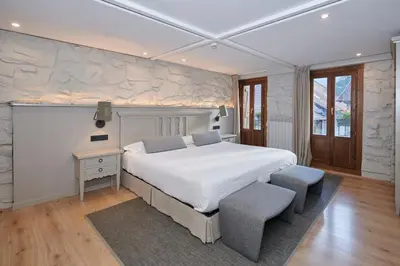 Cama o camas de una habitación en Hostal Lola