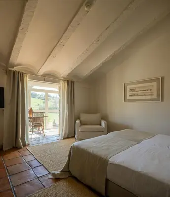 Cama o camas de una habitación en Hotel Finca El Peregrino