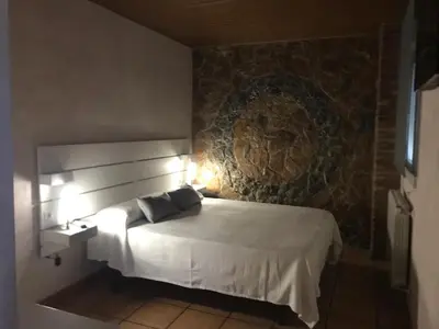 Cama o camas de una habitación en Turismo Rural Santa Lucia