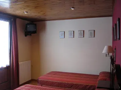 Una televisión o centro de entretenimiento en Casa La Abadía
