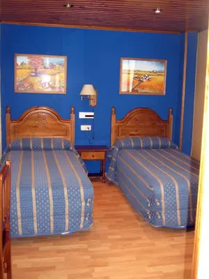 Cama o camas de una habitación en Casa La Abadía