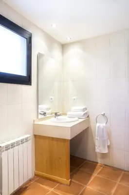 Un baño de Apartamentos Casa Masover