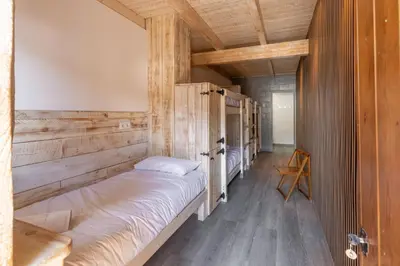 Cama o camas de una habitación en Alberg Taull