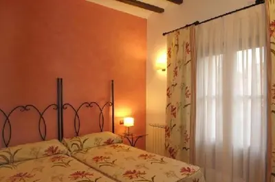 Cama o camas de una habitación en La Casona del Solanar