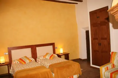 Cama o camas de una habitación en La Casona del Solanar
