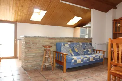 Zona de estar de Hostal La Plaza