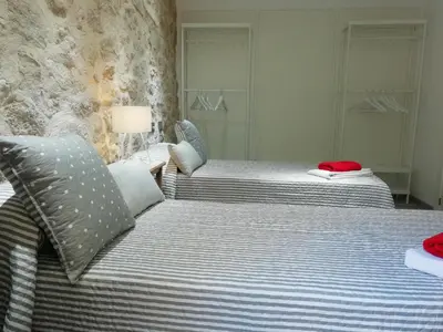 Cama o camas de una habitación en Los Ángeles Valderrobres