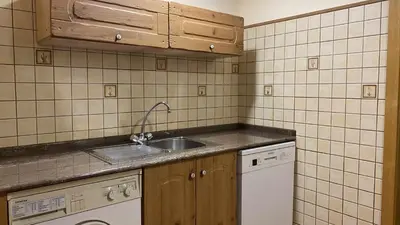 Una cocina o zona de cocina en Apartamentos Casa Lola Beceite, terraza y barbacoa