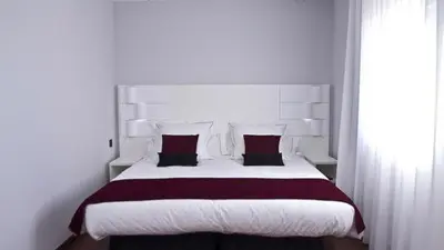 Cama o camas de una habitación en Hotel Pepo