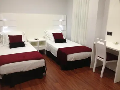 Cama o camas de una habitación en Hotel Pepo