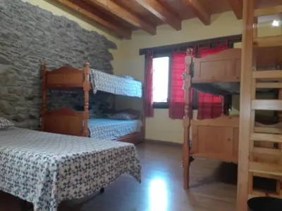 Cama o camas de una habitación en Refugi Casa Canelo