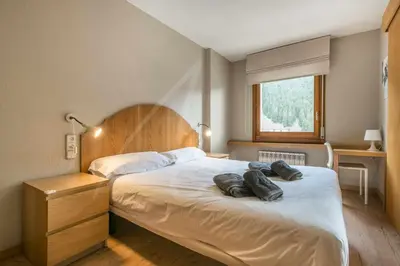 Cama o camas de una habitación en Solneu by SeaMount Rentals