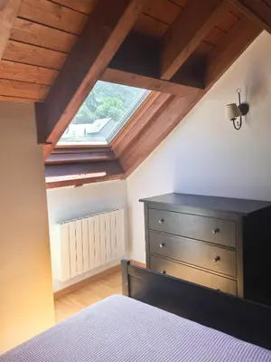 Cama o camas de una habitación en Cau d Aneu Duplex cerca de Bonaigua Baqueira y Aigüestortes