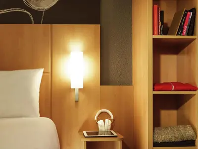 Cama o camas de una habitación en Ibis Lleida