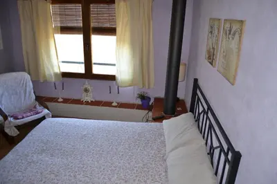 Cama o camas de una habitación en Casa JUNIA
