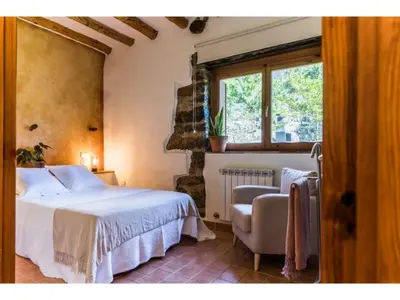 Cama o camas de una habitación en Casas Rurales Molinias