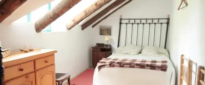 Cama o camas de una habitación en Jardín de Hoz