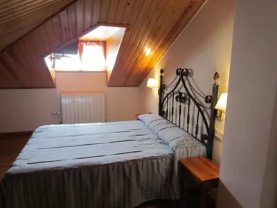 Cama o camas de una habitación en Hotel Las Nieves