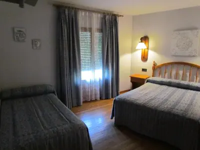 Cama o camas de una habitación en Hotel Las Nieves