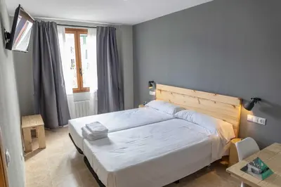 Cama o camas de una habitación en Alda Estella Hostel