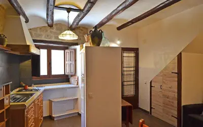 Una televisión o centro de entretenimiento en Casa Manolita