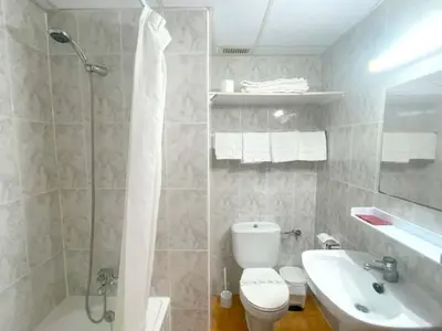 Un baño de Apartamentos Midi 3000