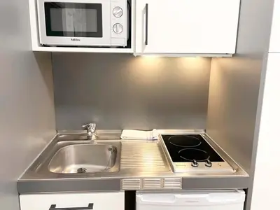 Una cocina o zona de cocina en Apartamentos Midi 3000
