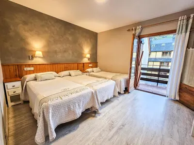 Cama o camas de una habitación en Hotel Casa Morlans 3000