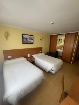Cama o camas de una habitación en Hostal El Volante