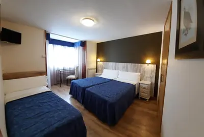 Cama o camas de una habitación en Hotel Casa Escolano