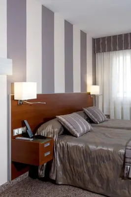 Cama o camas de una habitación en Hotel Marivella