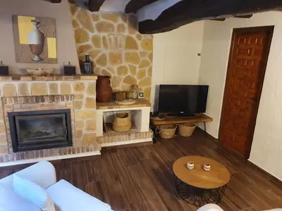 Una televisión o centro de entretenimiento en Casa Marèlia, Costa Daurada Rural