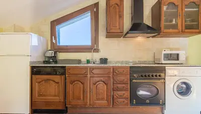 Una cocina o zona de cocina en Apartamento Llorens