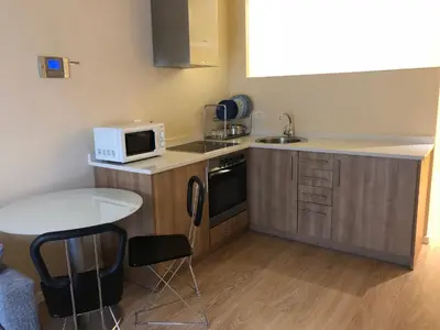Una cocina o zona de cocina en Apartamentos Villava Pamplona