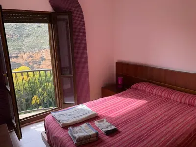 Cama o camas de una habitación en CASA RURAL CASCO ANTIGUO