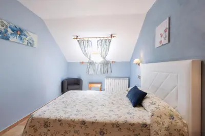Cama o camas de una habitación en Apartamentos Cinca