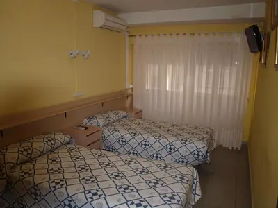 Cama o camas de una habitación en Hostal San Jorge