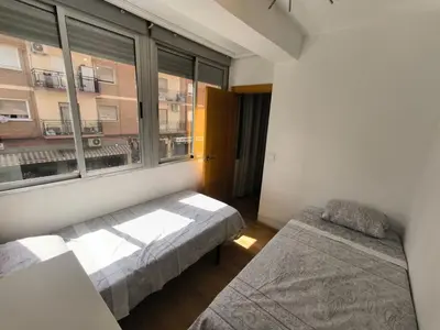 Cama o camas de una habitación en Piso Avenida de Madrid