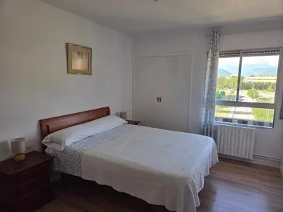 Cama o camas de una habitación en Excelente apartamento en el Pirineo aragonés