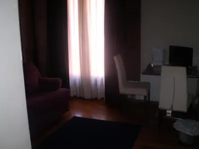 Una televisión o centro de entretenimiento en Posada Arco de San Miguel