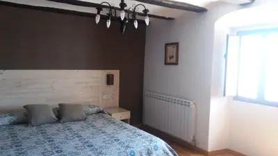 Cama o camas de una habitación en Casa Rural Jaxo