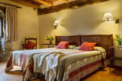 Cama o camas de una habitación en Hotel Akerreta