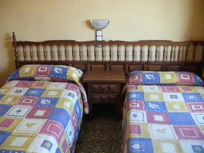 Cama o camas de una habitación en Hostal Rodes