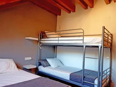Cama o camas de una habitación en Apartamento dúplex Esterri d'Aneu